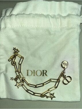 Dior Gold Star Link Phone Charm with Dior jewelry pouch